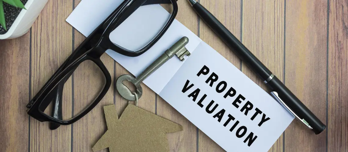 A property valuer assessing a home in Hobart